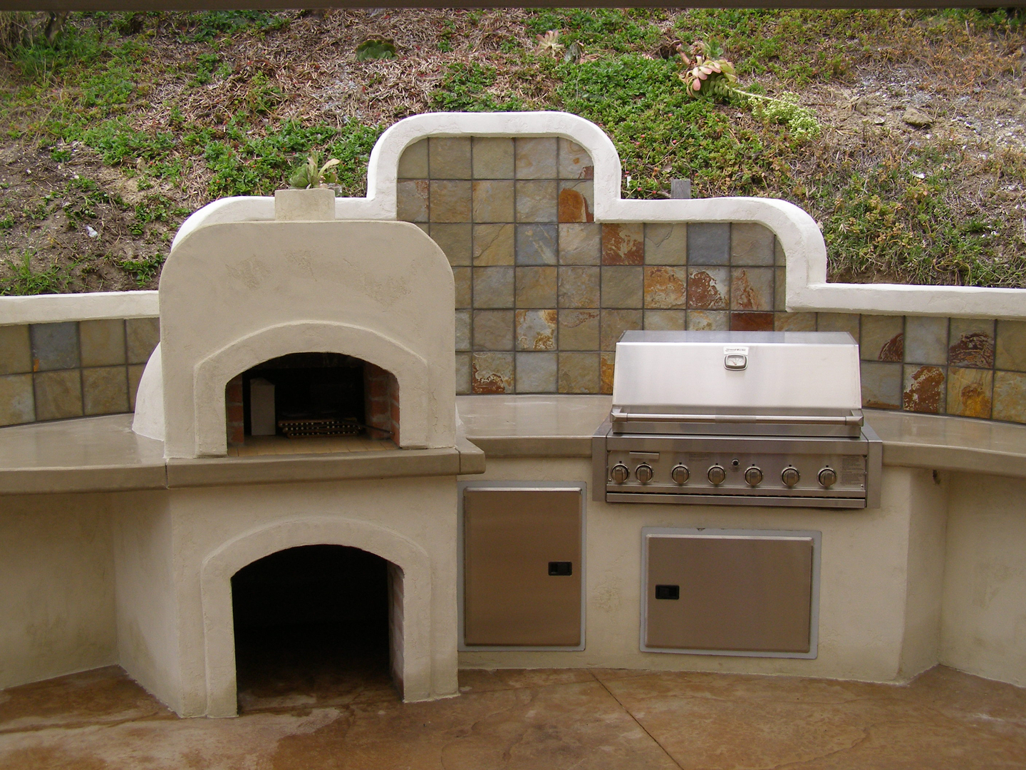 A Grill Space With Wood Oven Built