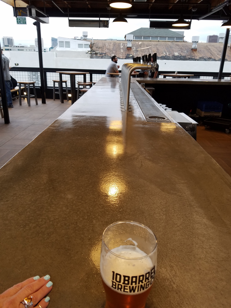 A Finished Counter Space of a Bar With Faucets for Drinks