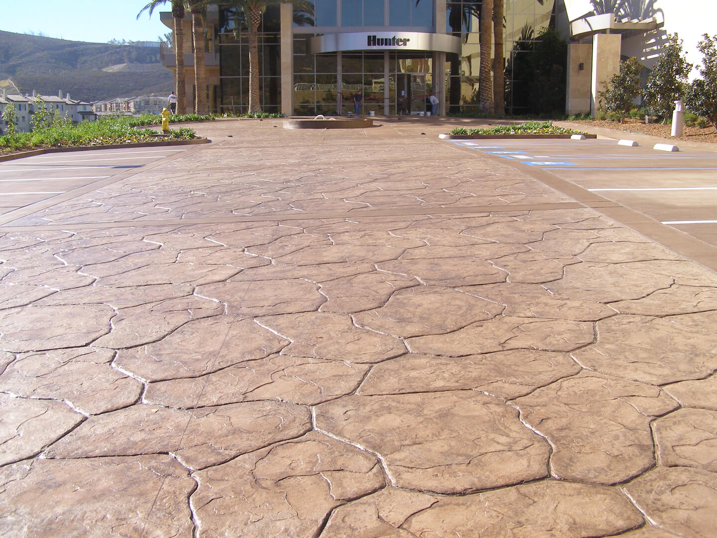 A Stone Concrete Stamp Flooring Infront of a Building