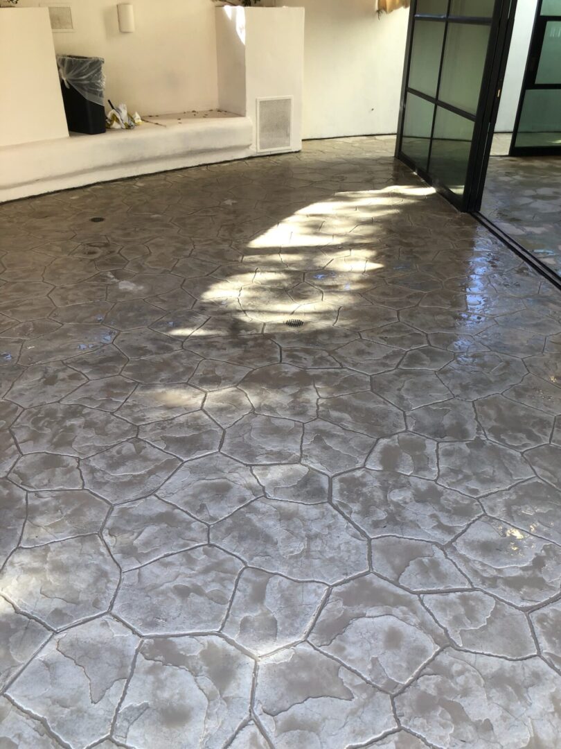 Close view of gray stamp concrete floor